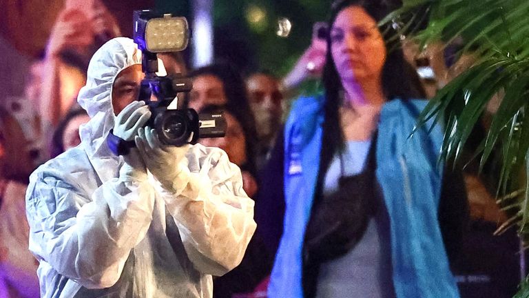 Forenzní v hotelu.  Foto: Reuters