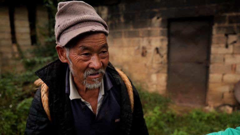 Pan Tan, farmář z ‚Kuangshan Zhen‘ nebo ‚Mine Town, v provincii Yunnan v jižní Číně 