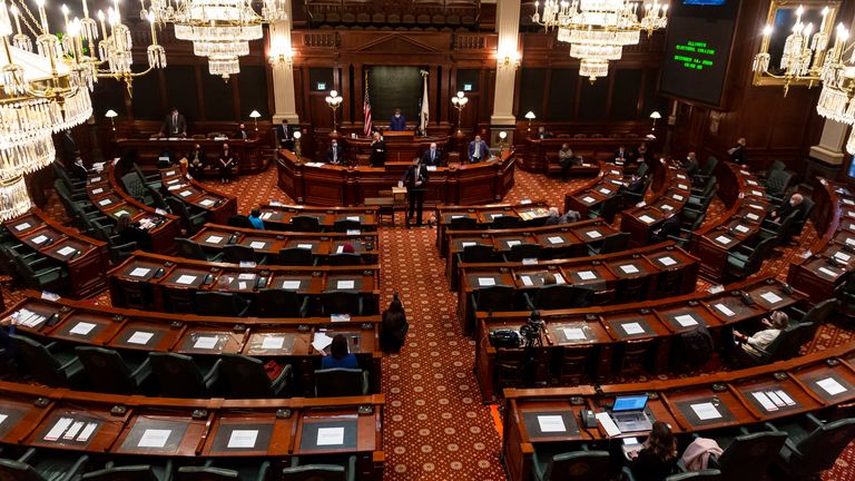 Members of the Illinois Electoral College met to cast ballots at the  at the Illinois State Capitol on 14 December 2020. Pic: AP