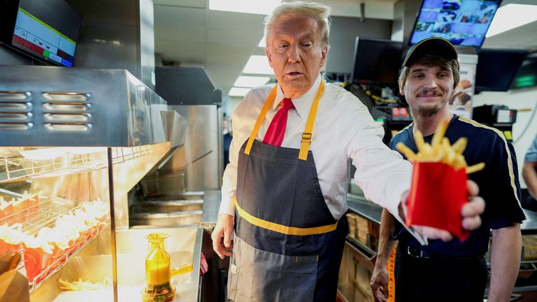 Donald Trump works behind the counter during a visit to McDonald's in Feasterville-Trevose.
Pic Reuters