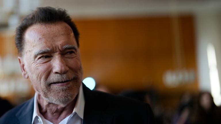 Former California Governor and actor Arnold Schwarzenegger arrives for a ceremony to receive a honorary doctorate by the Hertie School, a university of governance, in Berlin, Germany, Tuesday, Sept. 17, 2024. (AP Photo/Markus Schreiber)