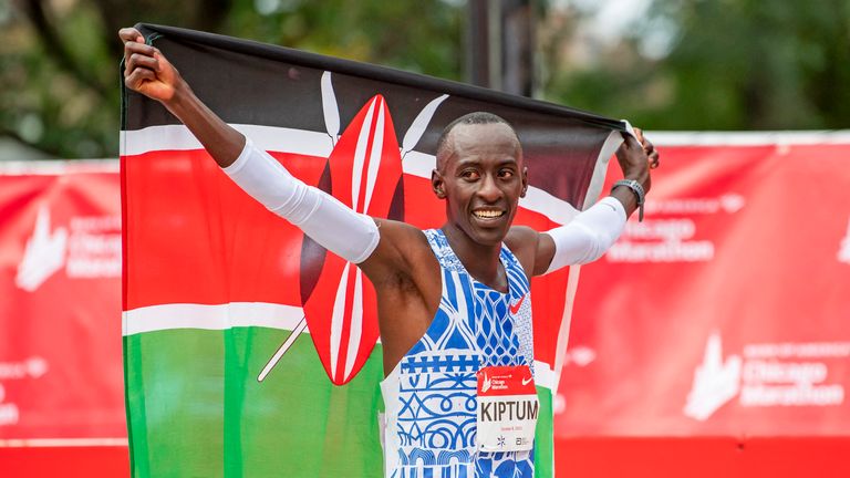 Oct 8, 2023; Chicago, IL, USA; Kelvin Kiptum (KEN) celebrates after finishing in a world record time of 2:00:35 to win the Chicago Marathon at Grant Park. Mandatory Credit: Patrick Gorski-USA TODAY Sports