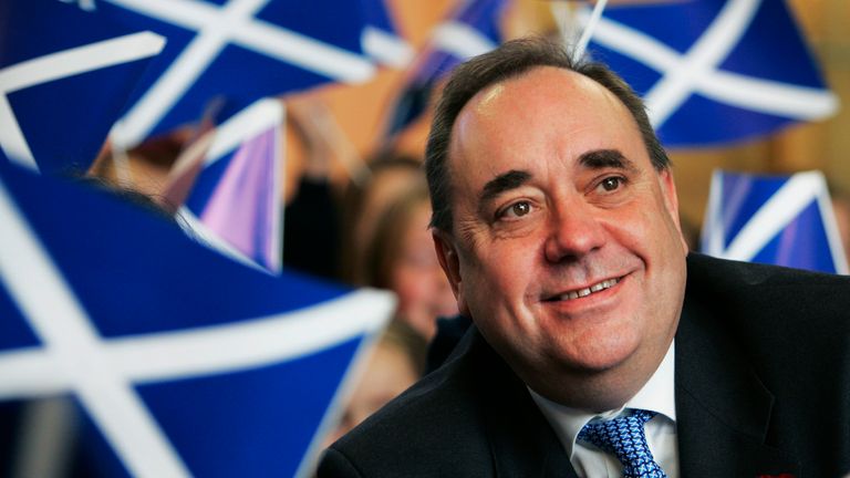 Scotland's then first minister Alex Salmond smiles surrounded by national flags in 2007. Pic: Reuters