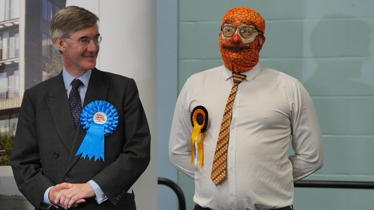 Rees-Mogg listens to the results alongside the bean candidate, whose slogan was reportedly "Make brunch great again". Pic: PA