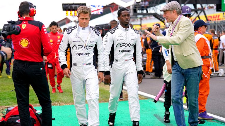 Brad Pitt and Damson Idris filming for a formula one movie during the British Grand Prix 2023 at Silverstone, Towcester. Picture date: Sunday July 9, 2023.