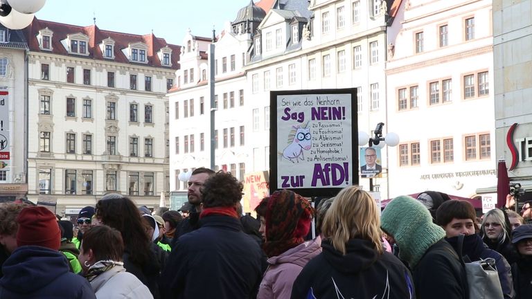 Anti-AfD protesters gather outside an AfD rally in Saxony