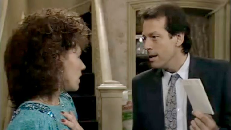 Eastenders at 40: Angie Watts (Anita Dobson), Den Watts (Leslie Grantham), as Den presents Angie with divorce papers. Pic: BBC 1986