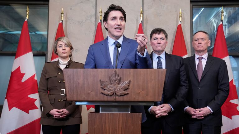 Justin Trudeau holds a news conference on imposed U.S. tariffs as Foreign Affairs Minister Melanie Joly, Finance Minister Dominic LeBlanc and Public Safety Minister David McGuinty look on in Ottawa.
Pic: The Canadian Press/AP