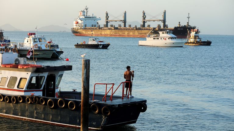 A cargo ship sails towards the Bridge of the Americas, which spans the entrance to the Panama Canal, after newly sworn-in U.S. President Donald Trump's remarks during his inauguration speech, when he vowed that the United States would take back the canal, in Panama City, Panama January 22, 2025. REUTERS/Aris Martinez