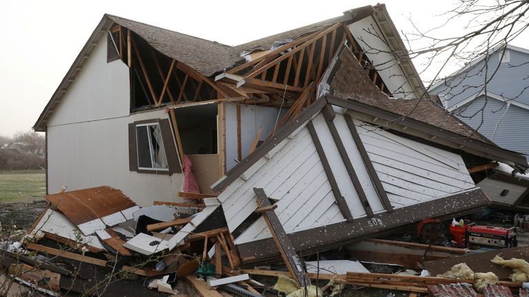 Zbytky zničeného domu ve Florissantu, Missouri. Pic: Reuters