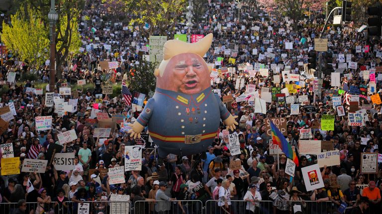 (DD has blurred all swear words)
SENSITIVE MATERIAL. THIS IMAGE MAY OFFEND OR DISTURB..Demonstrators take part in a 'Hands Off!' protest against U.S. President Donald Trump and his adviser Elon Musk, in Los Angeles, California, U.S., April 5, 2025. REUTERS/Daniel Cole