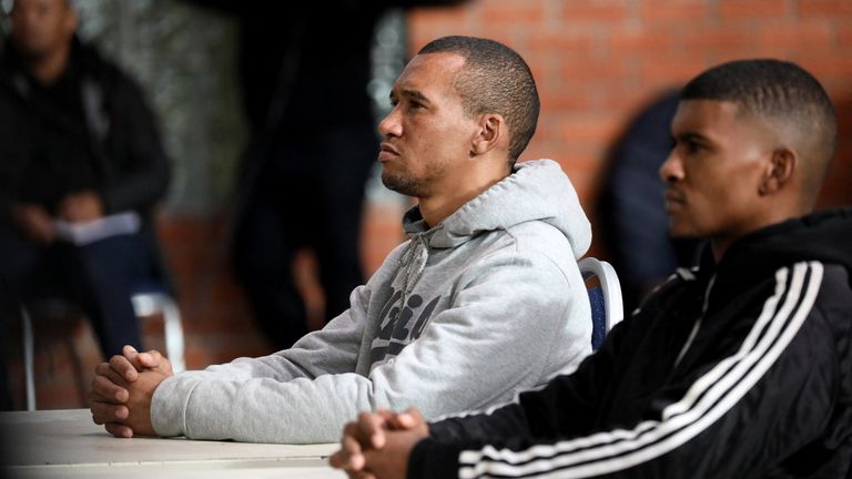 Jacquen Apollis a Steveno van Rhyn.  Pic: Reuters